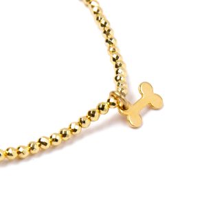 Detalle Pulsera Dorada de Victoria Vielle - Benéfica